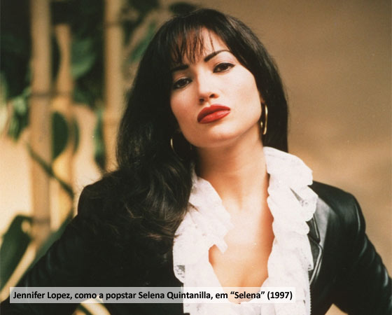 MAIS LATINOS: Começa a aumentar o número de personagens latinos nos filmes de Hollywood, mas a quantidade de atores não acompanha e muitas vezes quando os papéis latinos são de destaque, são interpretados por americanos. No fim da década, uma série de desenhos infantis traz como personagem principal uma latina: <i>Dora, a Exploradora</i> (1999). A atriz mexicana Salma Hayek aparece dançando no filme <i>Grande hotel</i>(1995) e vira símbolo sexual. Produções que representam bem a época são: <i>Lambada</i> (1990), <i>La Pastorela</i> (1991), <i>Mambo Kings</i> (1992), <i>American Me</i> (1992), <i>Blood In, Blood Out</i> (1993), <i>Carlitos Way</i> (1993), <i>Mi Vida Loca</i> (1994), <i>I Like It Like That</i> (1994), <i>My Family</i> (1995), <i>The Perez Family</i> (1995), <i>Down for the Barrio</i> (1996), <i>Lone Star</i> (1996), <i>Selena</i> (1997), <i>Fools Rush In</i> (1997), <i>187</i> (1997), <i>Luminarias</i> (1999). MAIS LATINOS: Começa a aumentar o número de personagens latinos nos filmes de Hollywood, mas a quantidade de atores não acompanha e muitas vezes quando os papéis latinos são de destaque, são interpretados por americanos. No fim da década, uma série de desenhos infantis traz como personagem principal uma latina: <i>Dora, a Exploradora</i> (1999). A atriz mexicana Salma Hayek aparece dançando no filme <i>Grande hotel</i>(1995) e vira símbolo sexual. Produções que representam bem a época são: <i>Lambada</i> (1990), <i>La Pastorela</i> (1991), <i>Mambo Kings</i> (1992), <i>American Me</i> (1992), <i>Blood In, Blood Out</i> (1993), <i>Carlitos Way</i> (1993), <i>Mi Vida Loca</i> (1994), <i>I Like It Like That</i> (1994), <i>My Family</i> (1995), <i>The Perez Family</i> (1995), <i>Down for the Barrio</i> (1996), <i>Lone Star</i> (1996), <i>Selena</i> (1997), <i>Fools Rush In</i> (1997), <i>187</i> (1997), <i>Luminarias</i> (1999).
