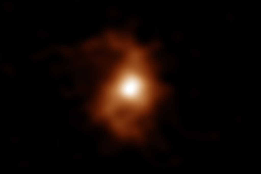 Imagem de galáxia que se assemelha com uma explosão desfocada.