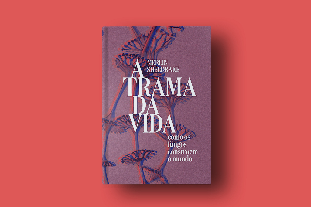 A capa do livro A Trama da Vida em fundo liso.